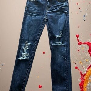 Women's Distressed Blue Jeans